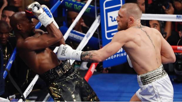 McGregor se enfrenta a Mayweather en una pelea vista por millones 